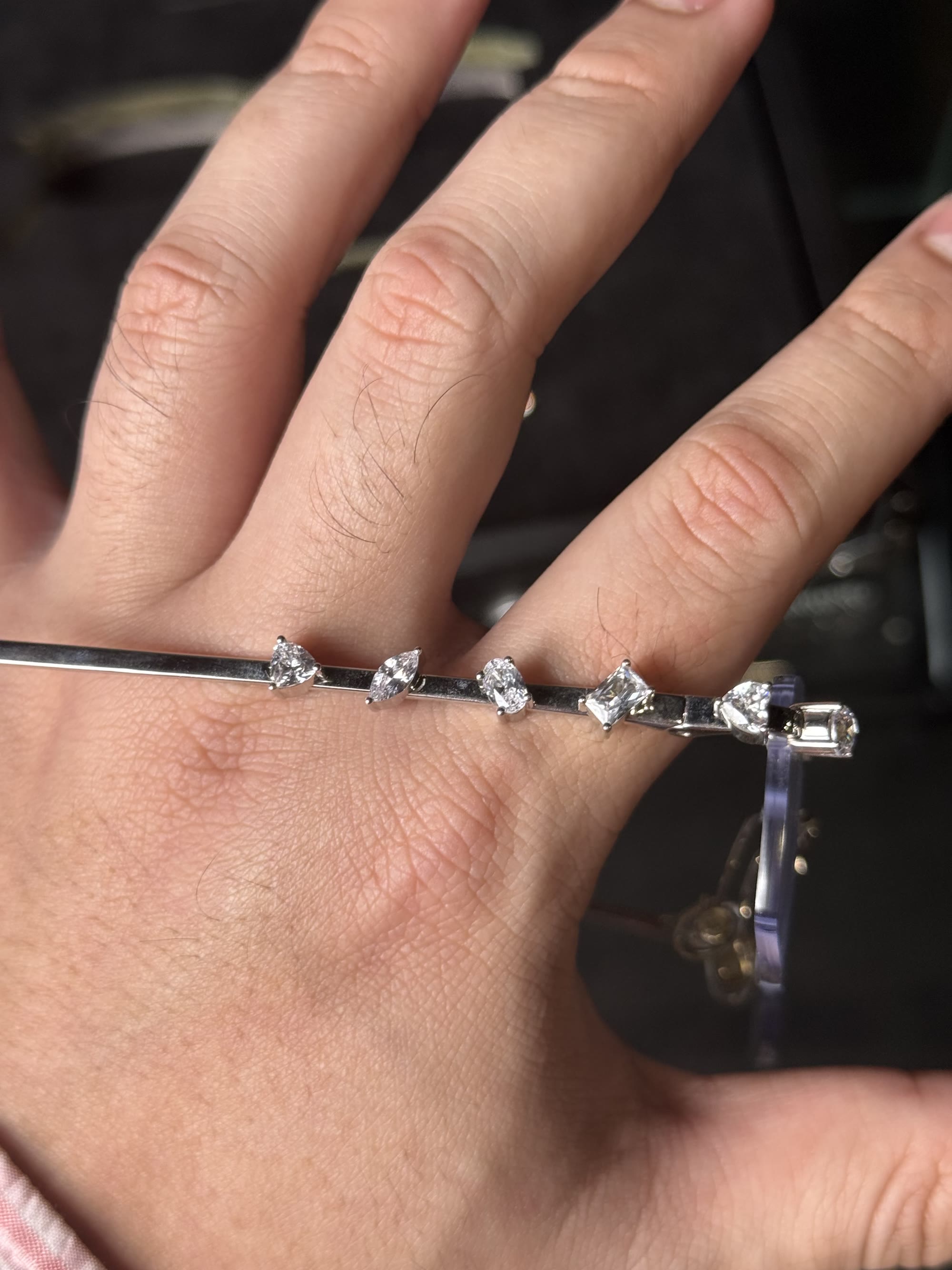 Macro of the arm across a hand, showing the six cuts